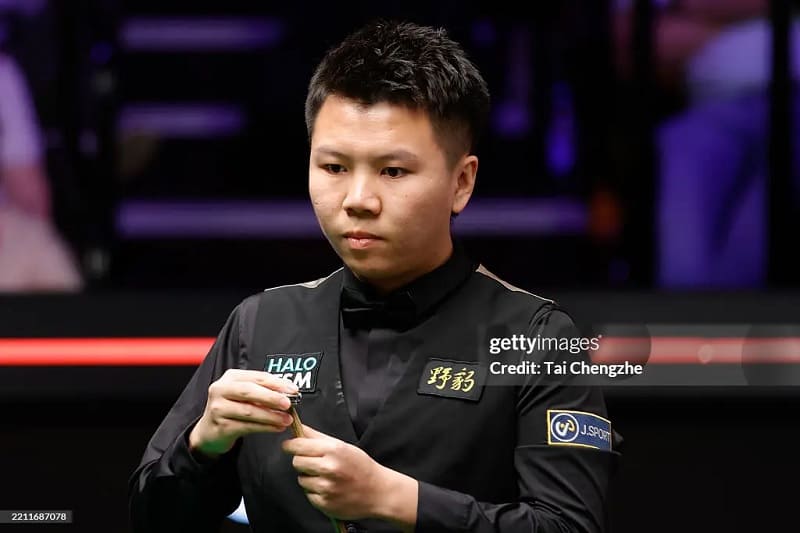 Чжоу Юэлун шокировал Марка Уильямса, выиграв матч 1/16 финала (фото gettyimages)