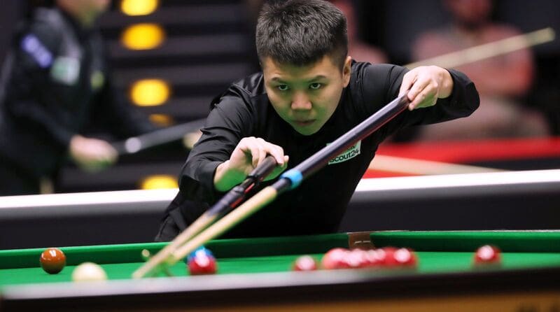 Чжоу Юэлун в первом матче основных этапов турнира в Сиане сыграет с Райаном Дэем (фото: WST)