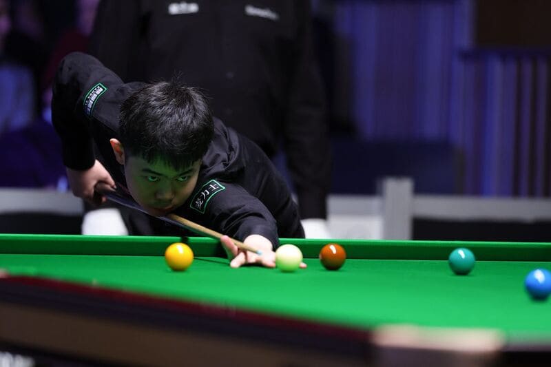 Юань Сыцзюнь выдержал битву против соотечественника Лун Цзэхуана (фото: WST)