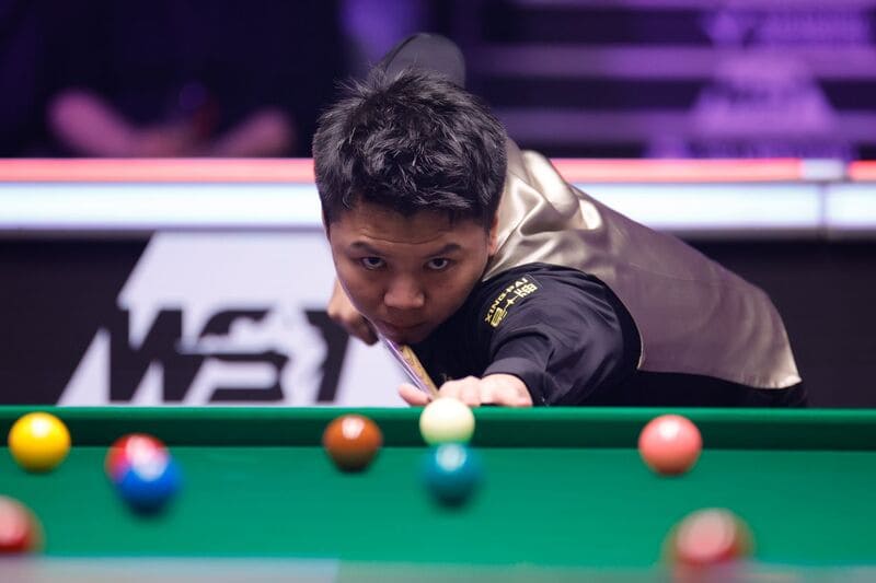 Чжоу Юэлун одержал первую в карьере победу над Ронни (фото: WST)